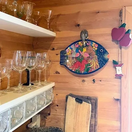 Norwegian Log Among Heather And Pine Trees